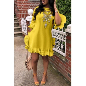 Her Yellow Mini Dress